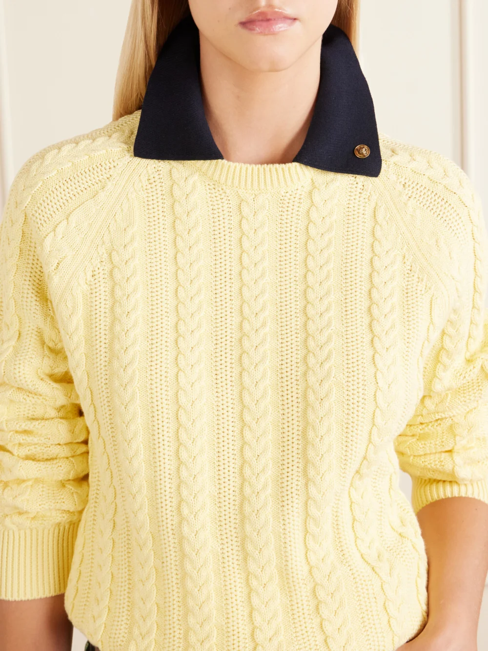 Close-up detail of the Versace Cable-knit Cotton Sweater