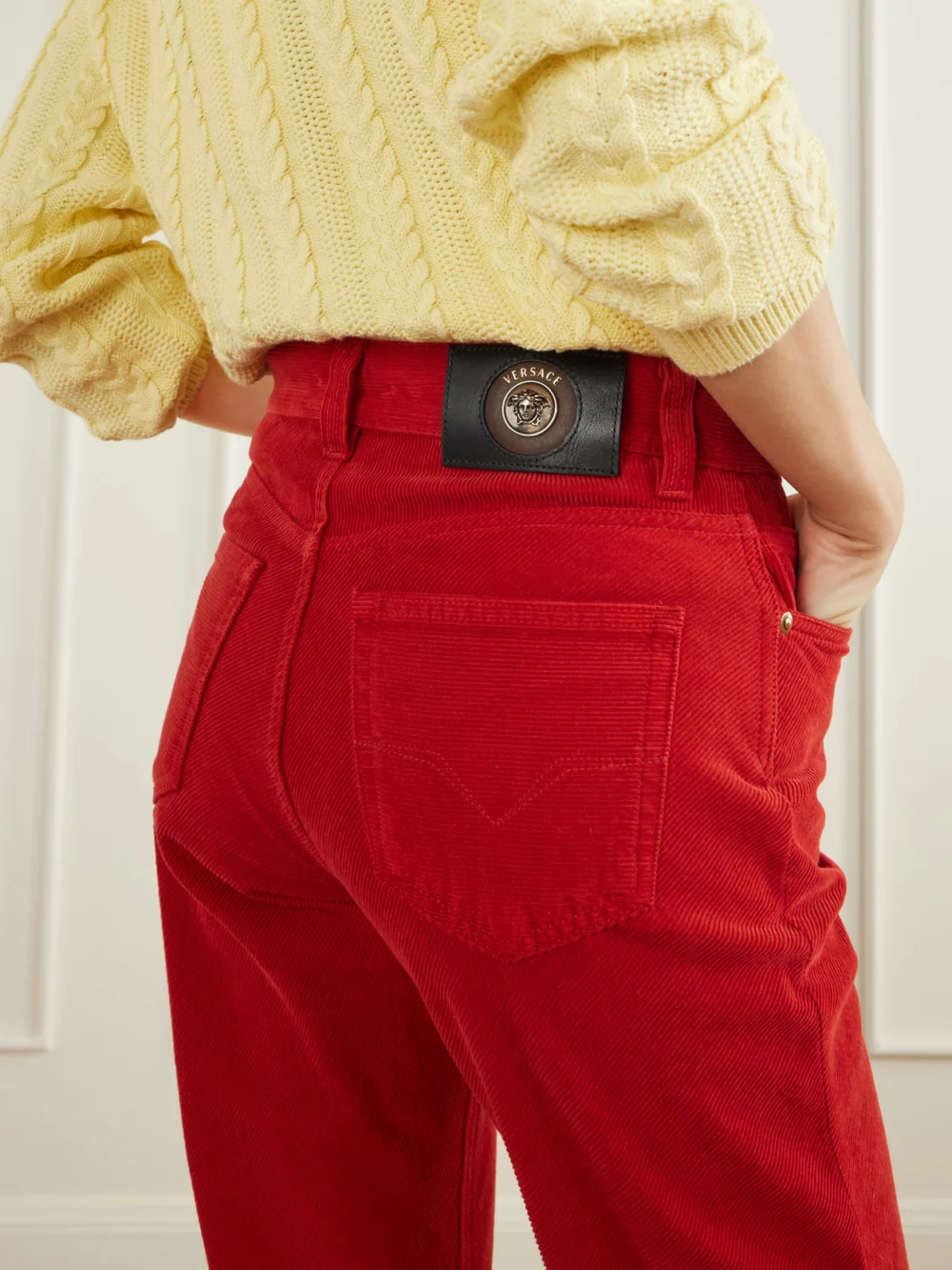 Close-up detail of the Versace Cotton-corduroy Straight-leg Pants
