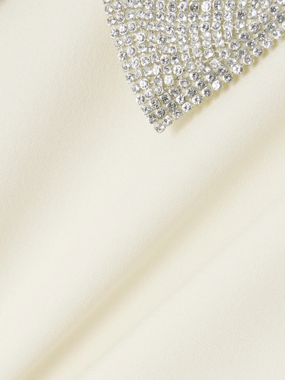 Close-up detail of the Versace Crystal-embellished Crepe Mini Dress