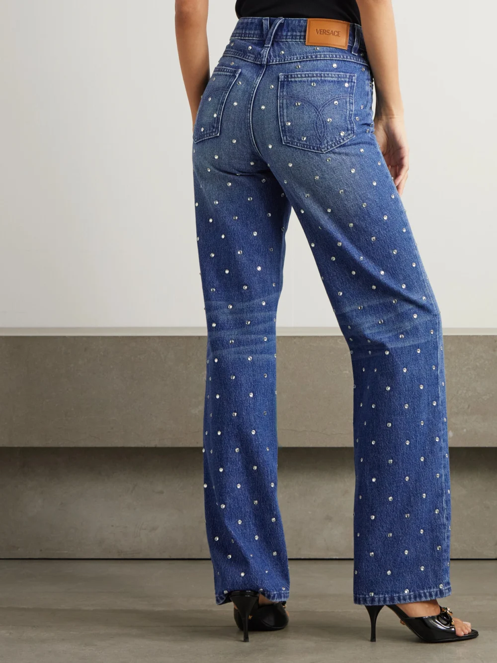 Back view of the Versace Crystal-embellished Mid-rise Straight-leg Jeans