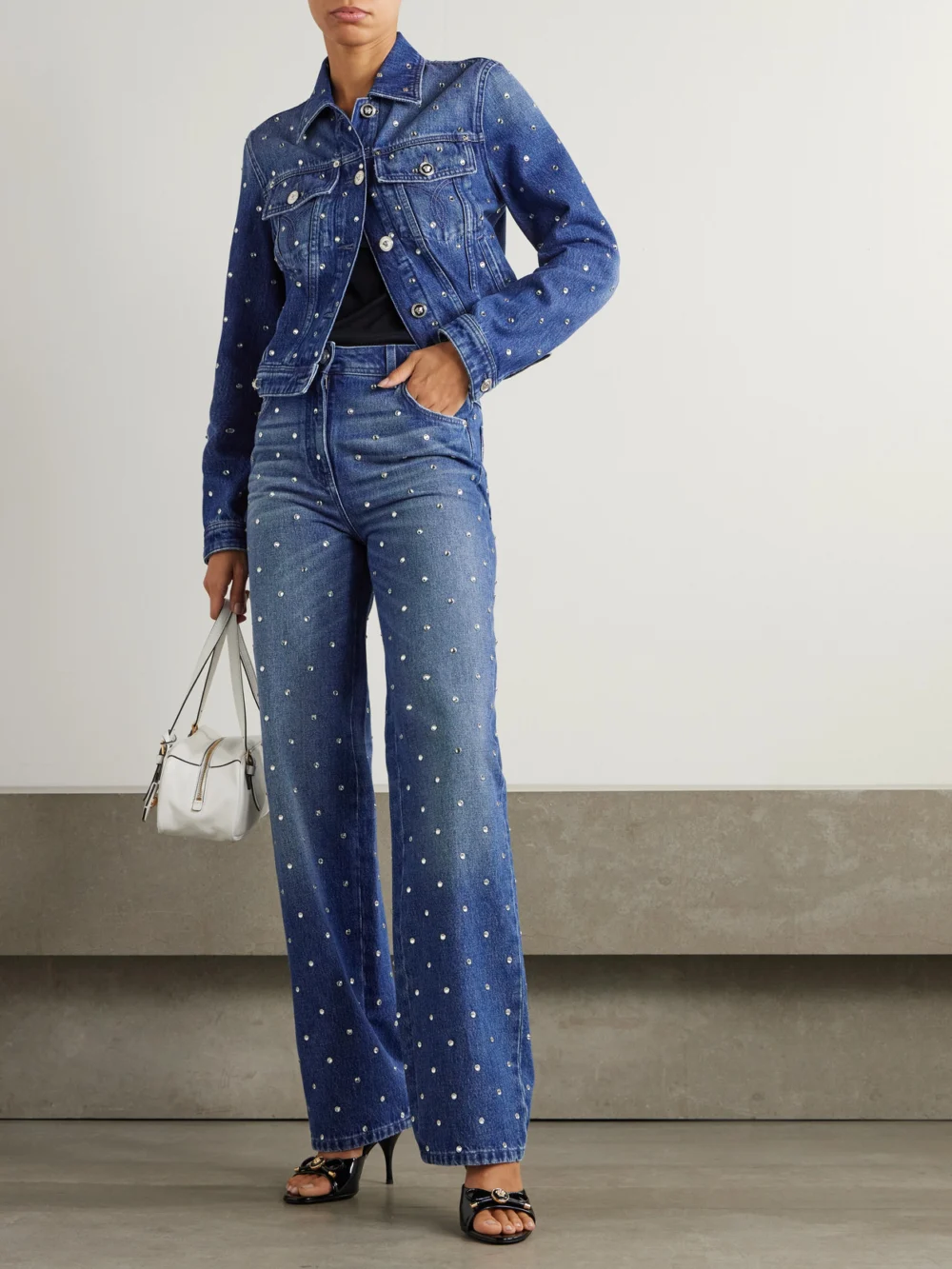 Versace Crystal-embellished Mid-rise Straight-leg Jeans, worn by a model