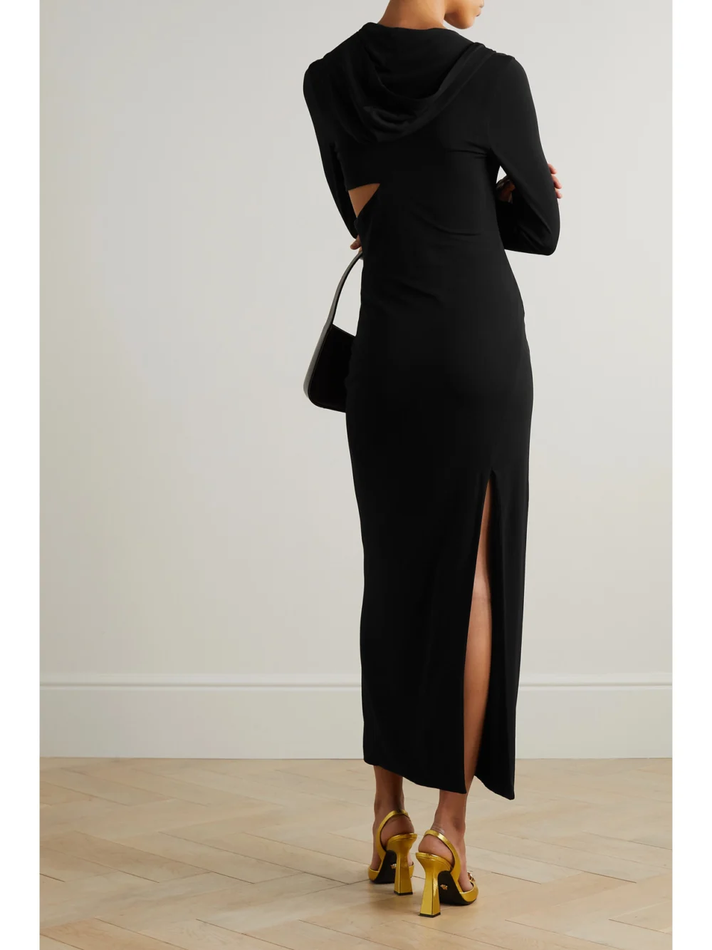 Back view of the Versace Cutout Hooded Stretch-jersey Maxi Dress