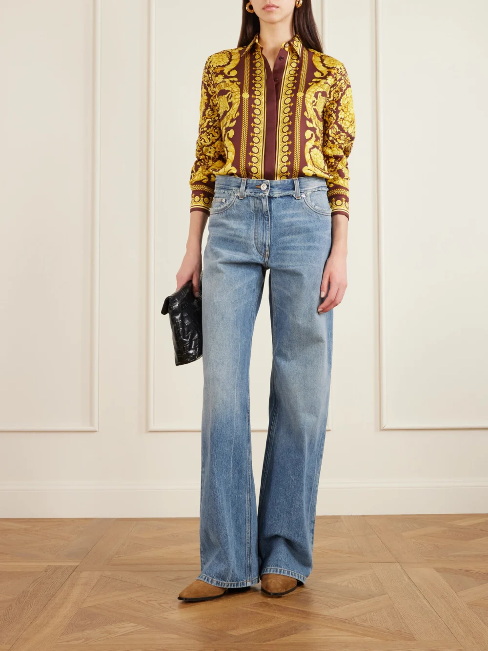 Versace Distressed Mid-rise Straight-leg Jeans, worn by a model