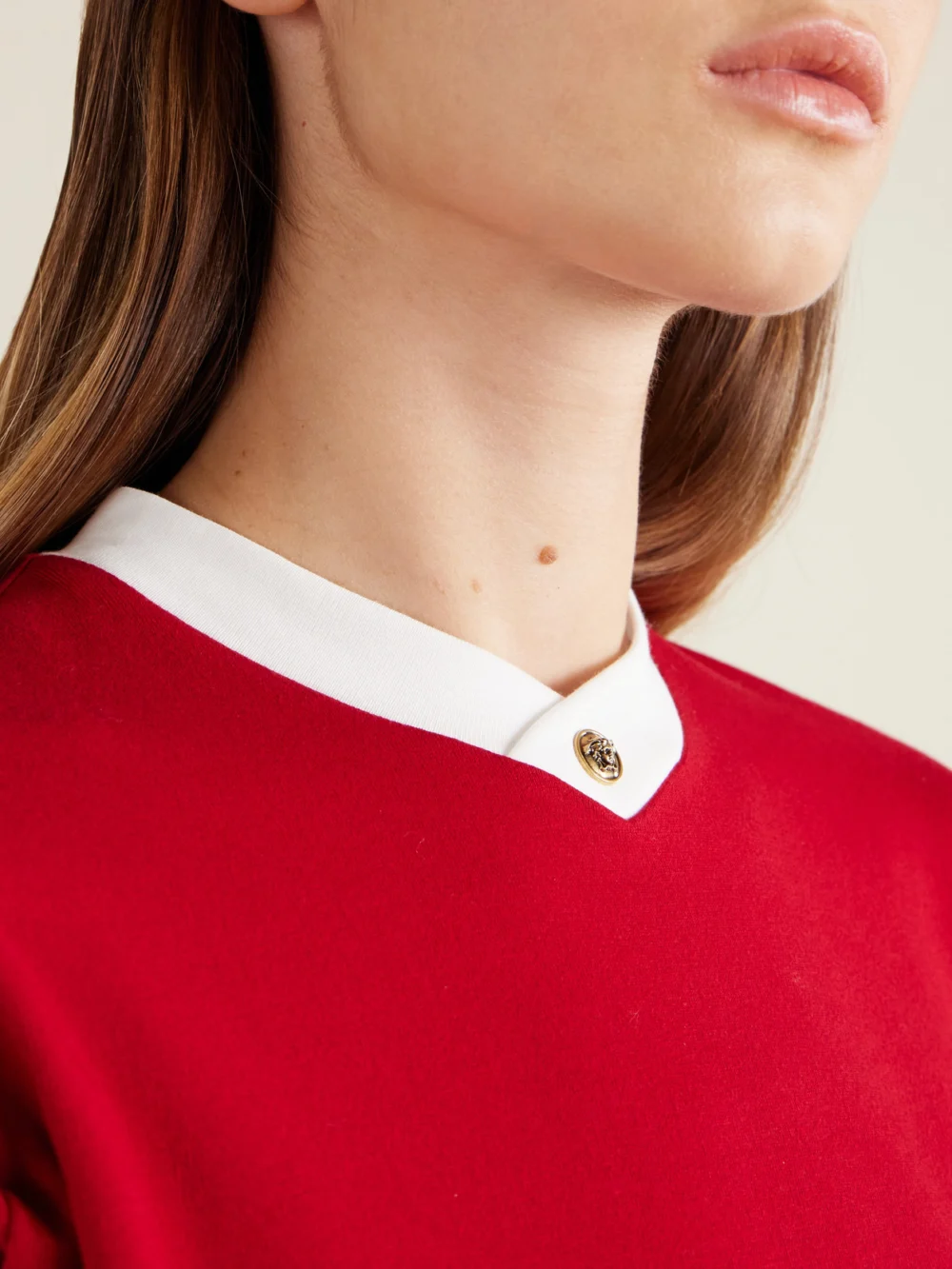 Close-up detail of the Versace Embellished Cotton-blend Jersey T-shirt