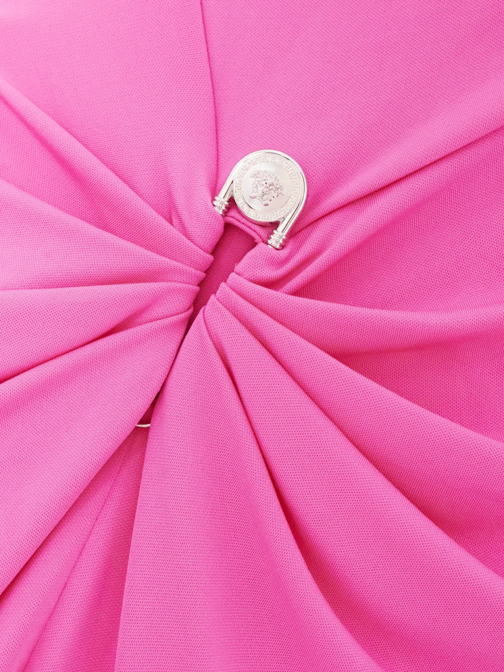 Close-up detail of the Versace Embellished Draped Stretch-jersey Gown