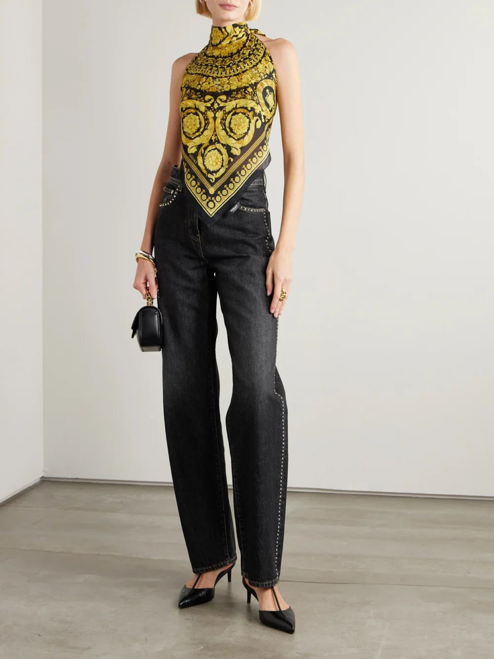 Versace Embellished High-rise Straight-leg Jeans, worn by a model