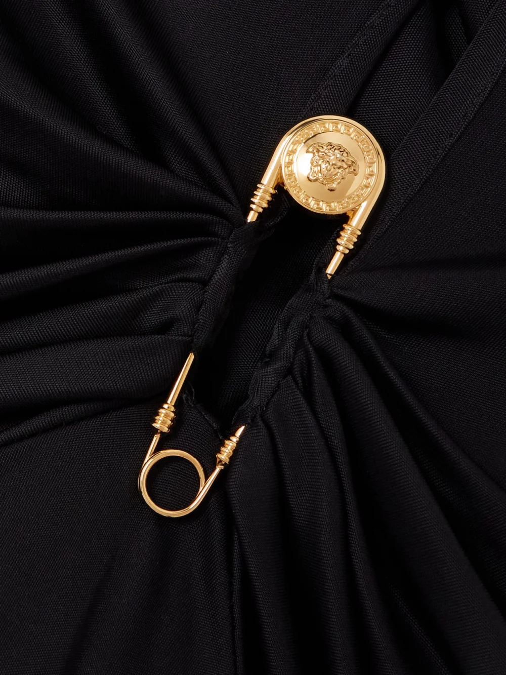 Close-up detail of the Versace Embellished Jersey Mini Dress