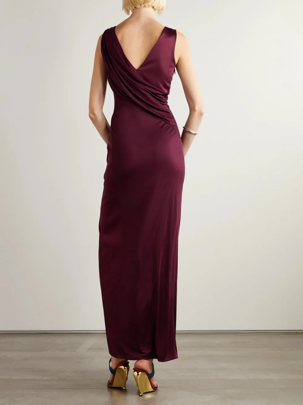 Back view of the Versace Embellished Paneled Draped Satin-jersey Gown
