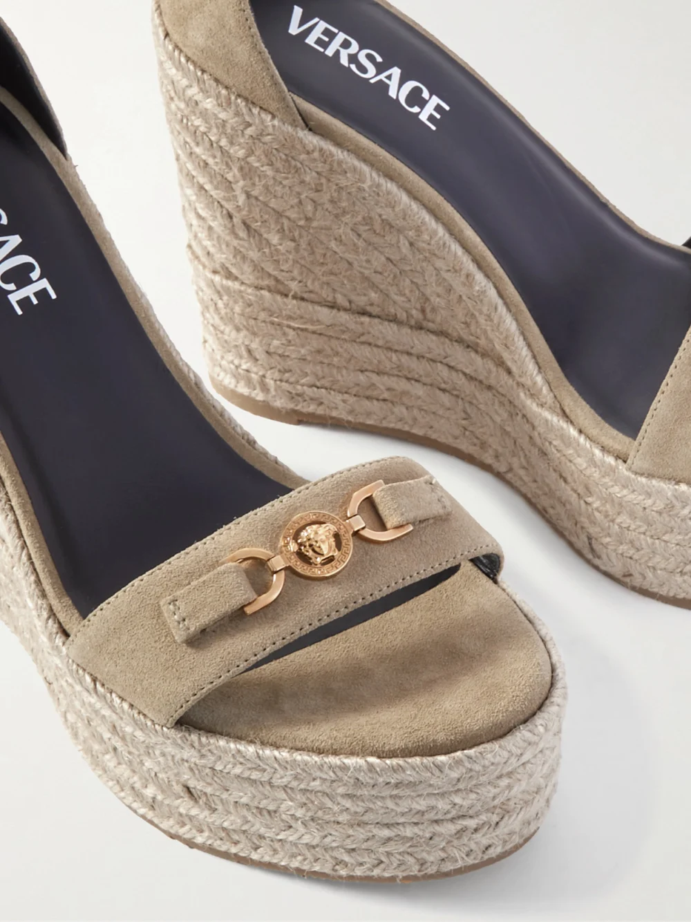 Close-up detail of the Versace Embellished Suede Espadrille Wedge Sandals