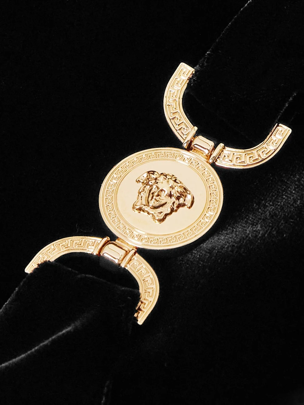 Close-up detail of the Versace Embellished Velvet Mini Dress