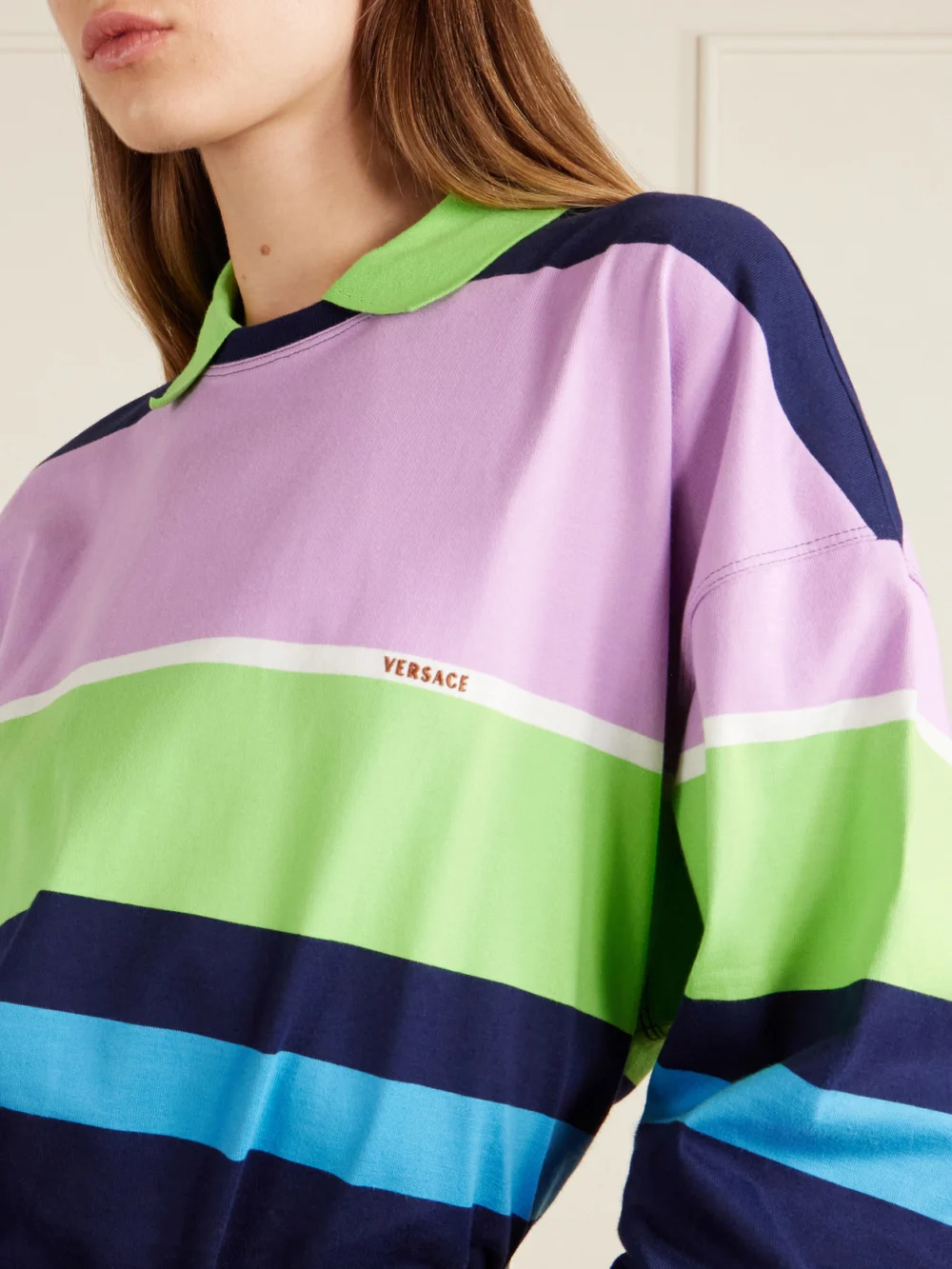 Close-up detail of the Versace Embroidered Striped Cotton-jersey Sweater