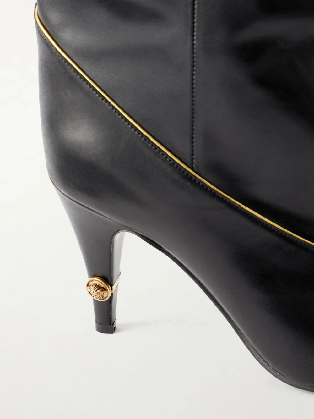 Close-up detail of the Versace Gianni 90 Calf Leather Knee Boots