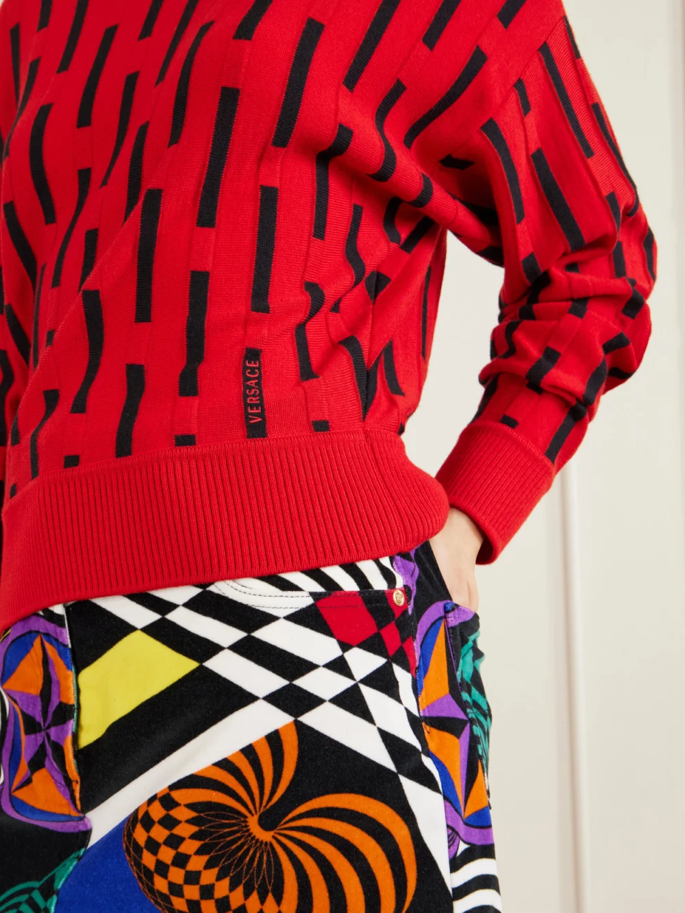 Close-up detail of the Versace Gianni Knitted Wool Sweater