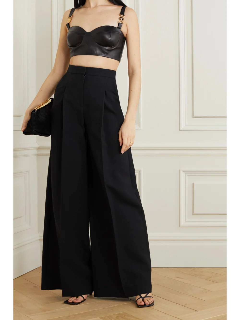 Versace Icons Embellished Jersey-panel Leather Bustier Top, worn by a model