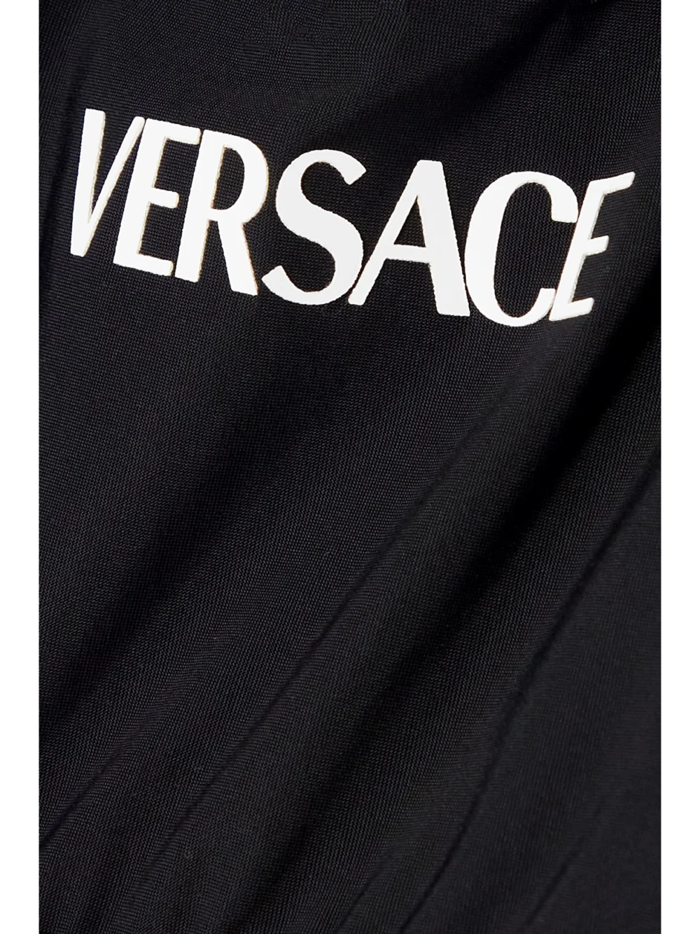 Close-up detail of the Versace La Greca Printed Stretch Sports Bra