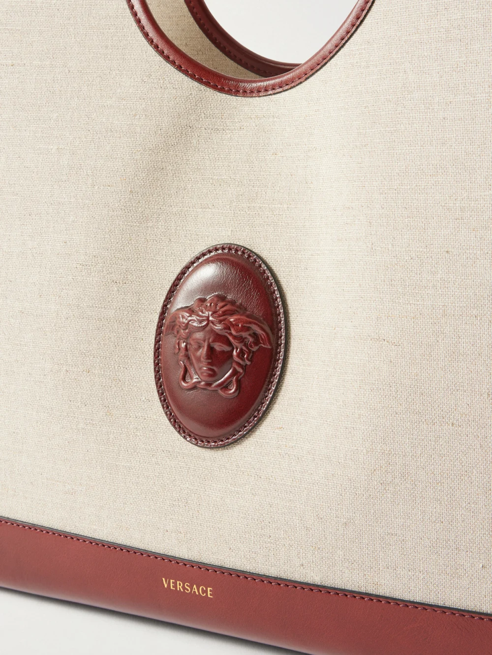 Close-up detail of the Versace Leather-trimmed Canvas Tote