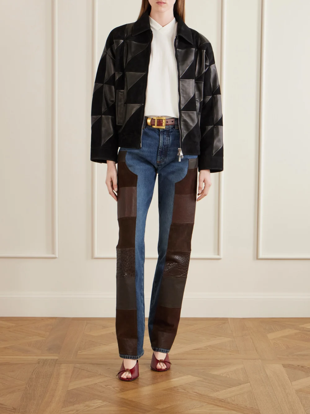 Versace Leather-trimmed Mid-waist Straight-leg Jeans, worn by a model