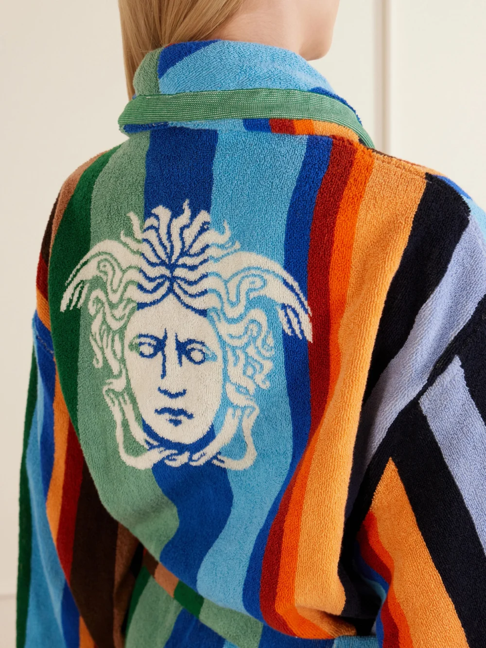 Close-up detail of the Versace Medusa Belted Striped Cotton-terry Robe