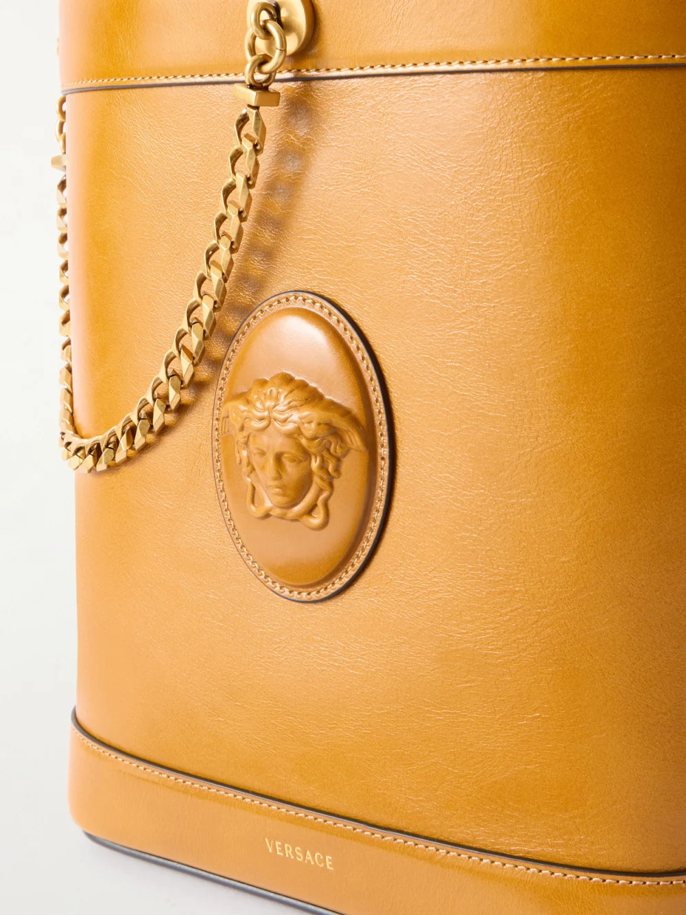Close-up detail of the Versace Pivot Small Leather Bucket Bag