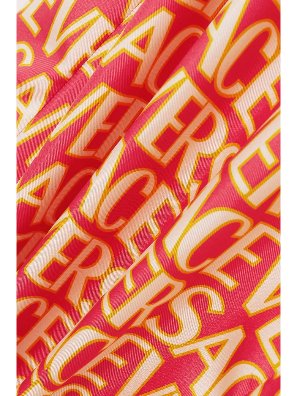 Close-up detail of the Versace Printed Silk-twill Wide-leg Pants