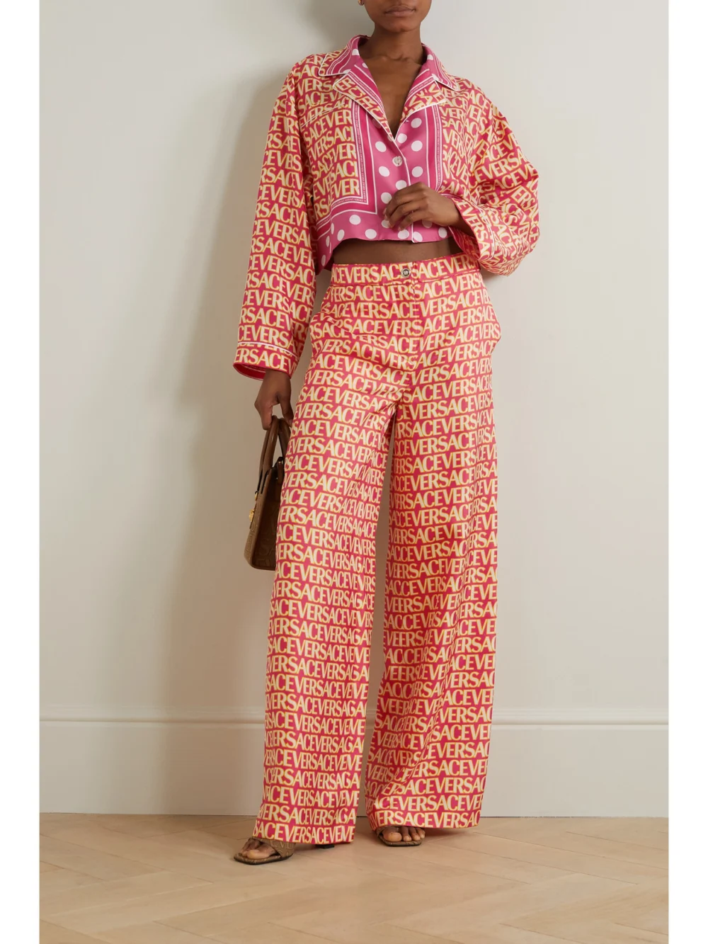 Versace Printed Silk-twill Wide-leg Pants, worn by a model