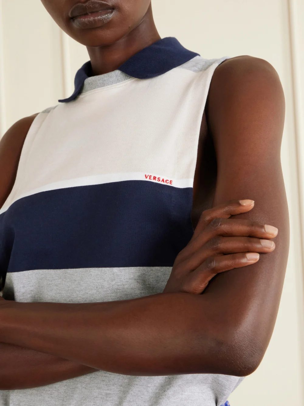 Close-up detail of the Versace Sleeveless Embroidered Striped Cotton T-shirt