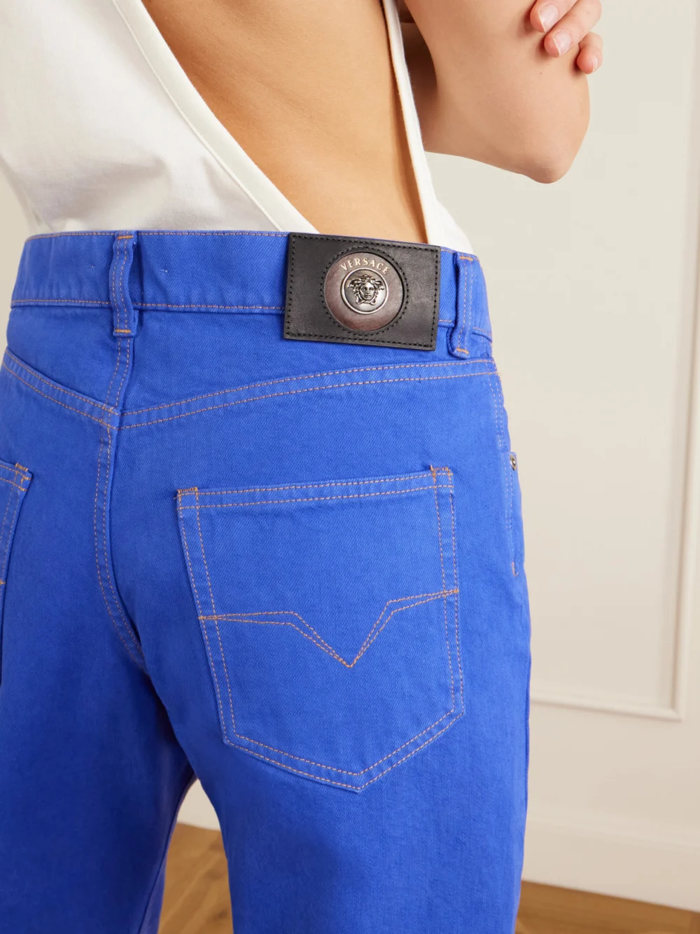 Close-up detail of the Versace Straight-leg Jeans