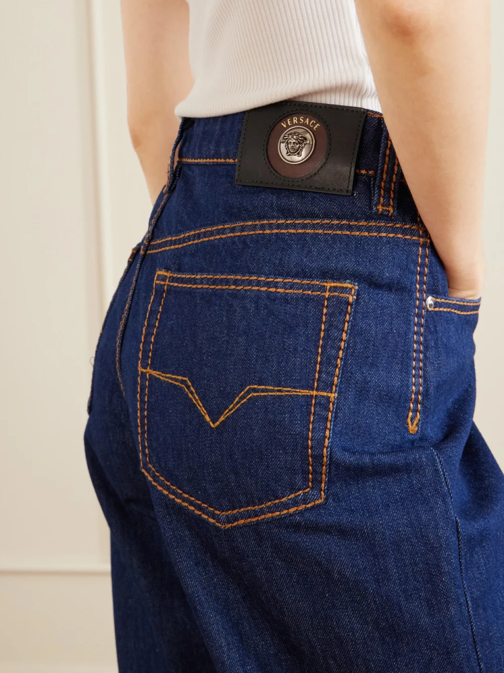 Close-up detail of the Versace Straight-leg Jeans