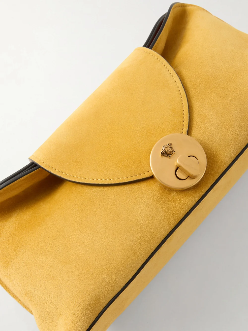 Close-up detail of the Versace Vivienne Logo-embellished Suede Clutch