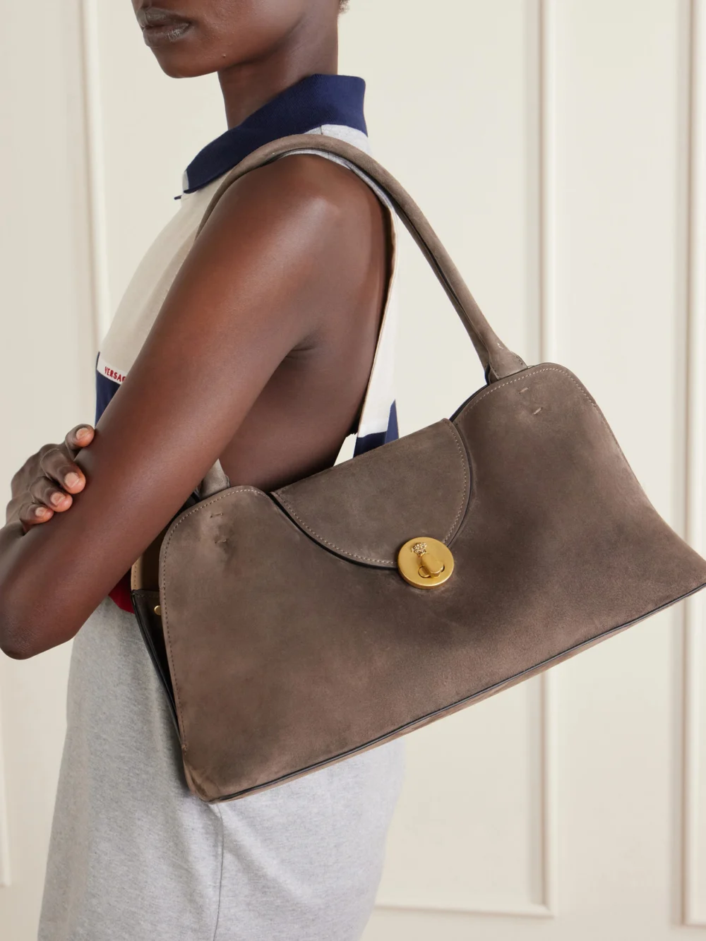 Versace Vivienne Logo-embellished Suede Shoulder Bag, styled view