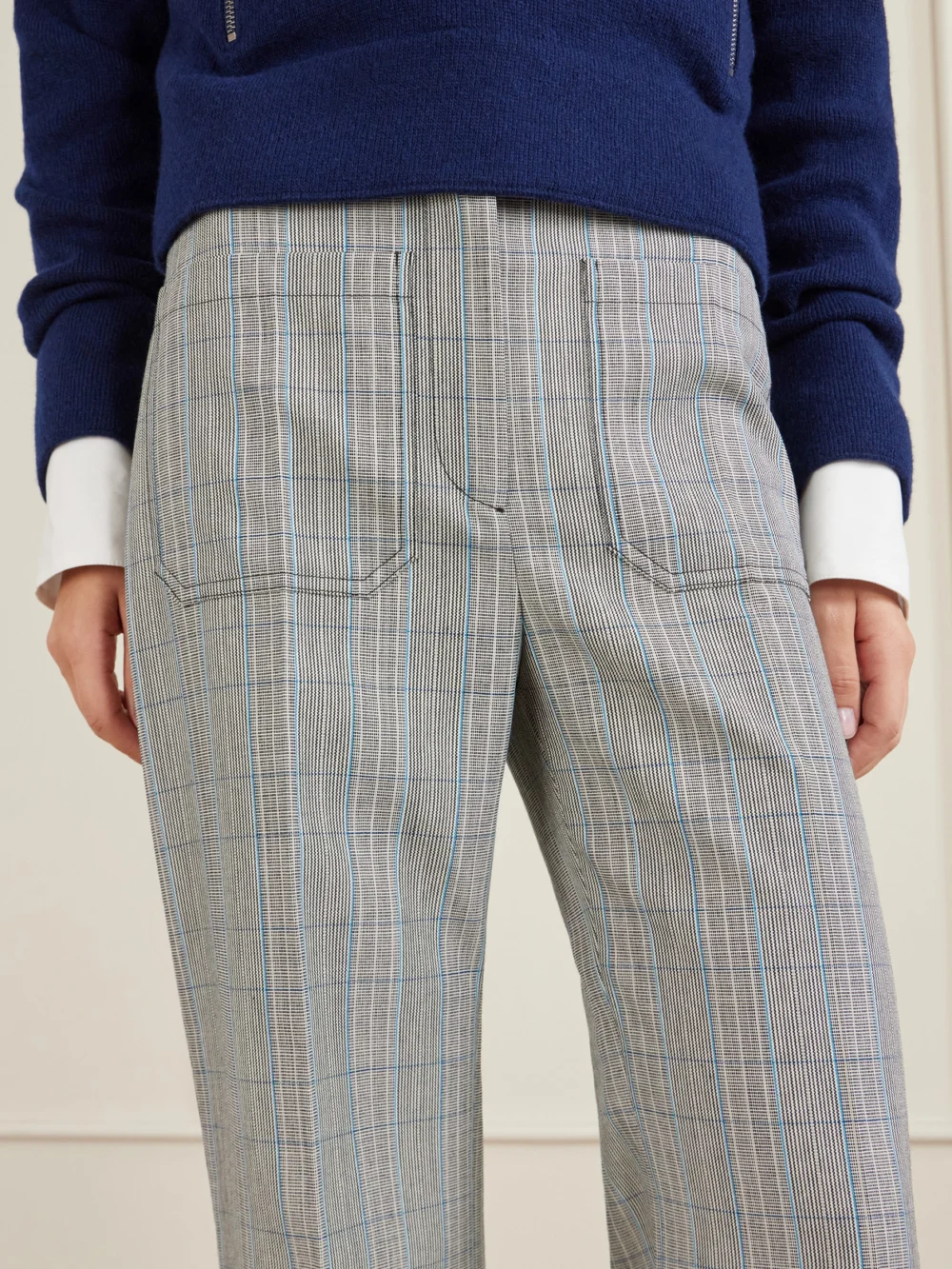 Close-up detail of the Victoria Beckham Alina Checked Wool Wide-leg Pants