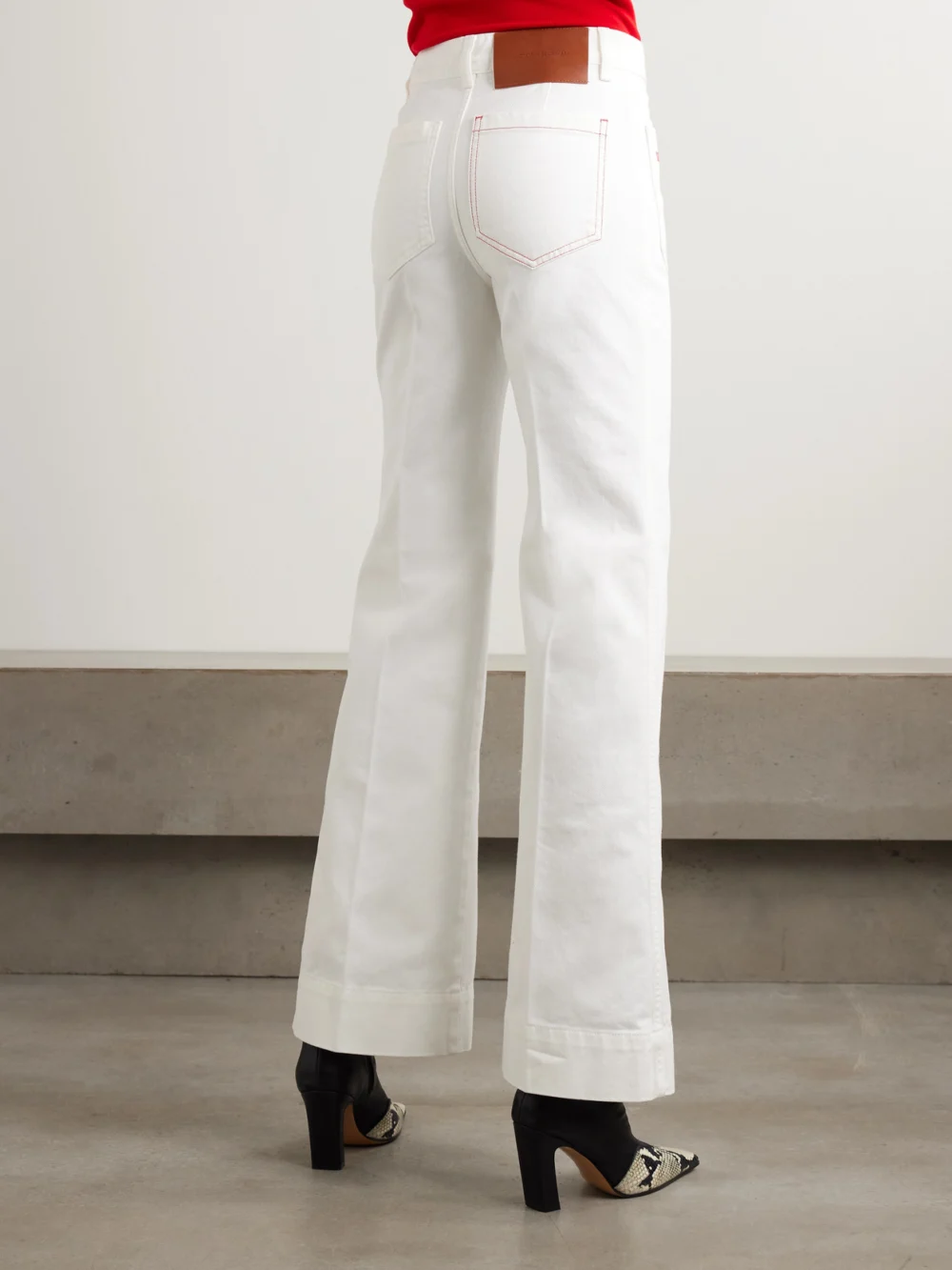 Back view of the Victoria Beckham Alina Embroidered High-rise Wide-leg Jeans