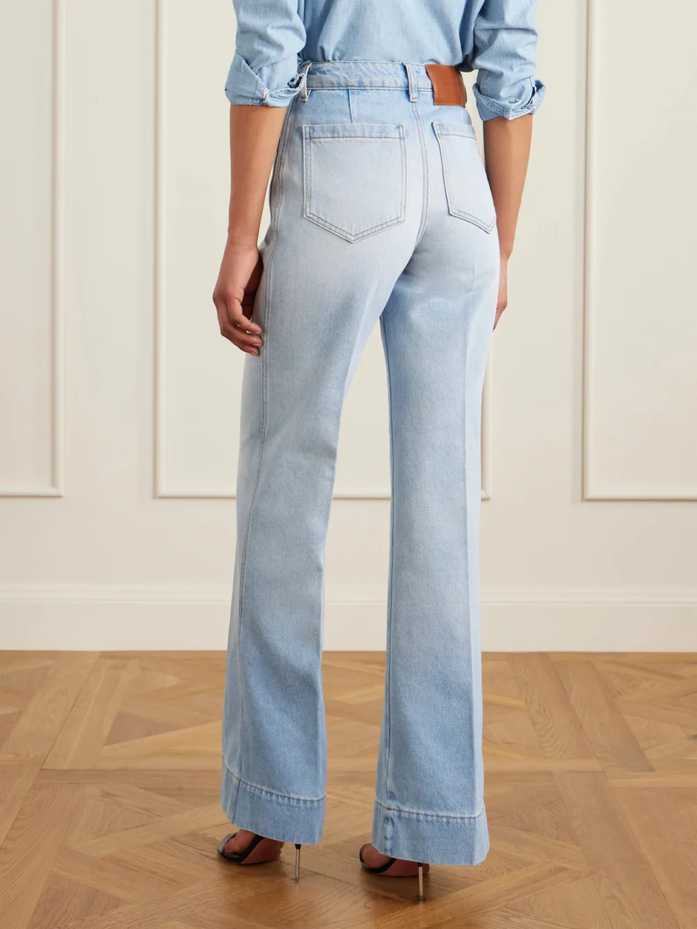 Back view of the Victoria Beckham Alina High-rise Wide-leg Jeans