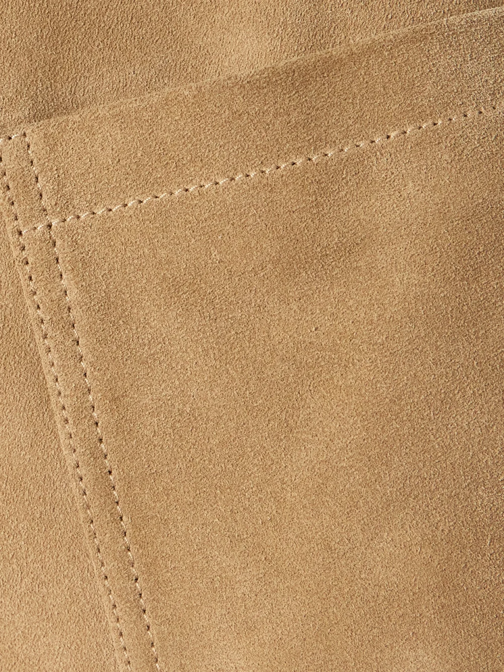 Close-up detail of the Victoria Beckham Alina Suede Flared Pants