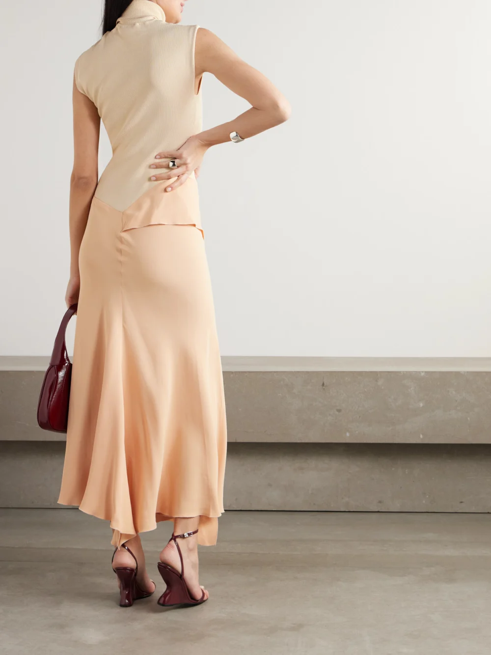 Back view of the Victoria Beckham Asymmetric Draped Gathered Ribbed-knit and Crepe Midi Dress