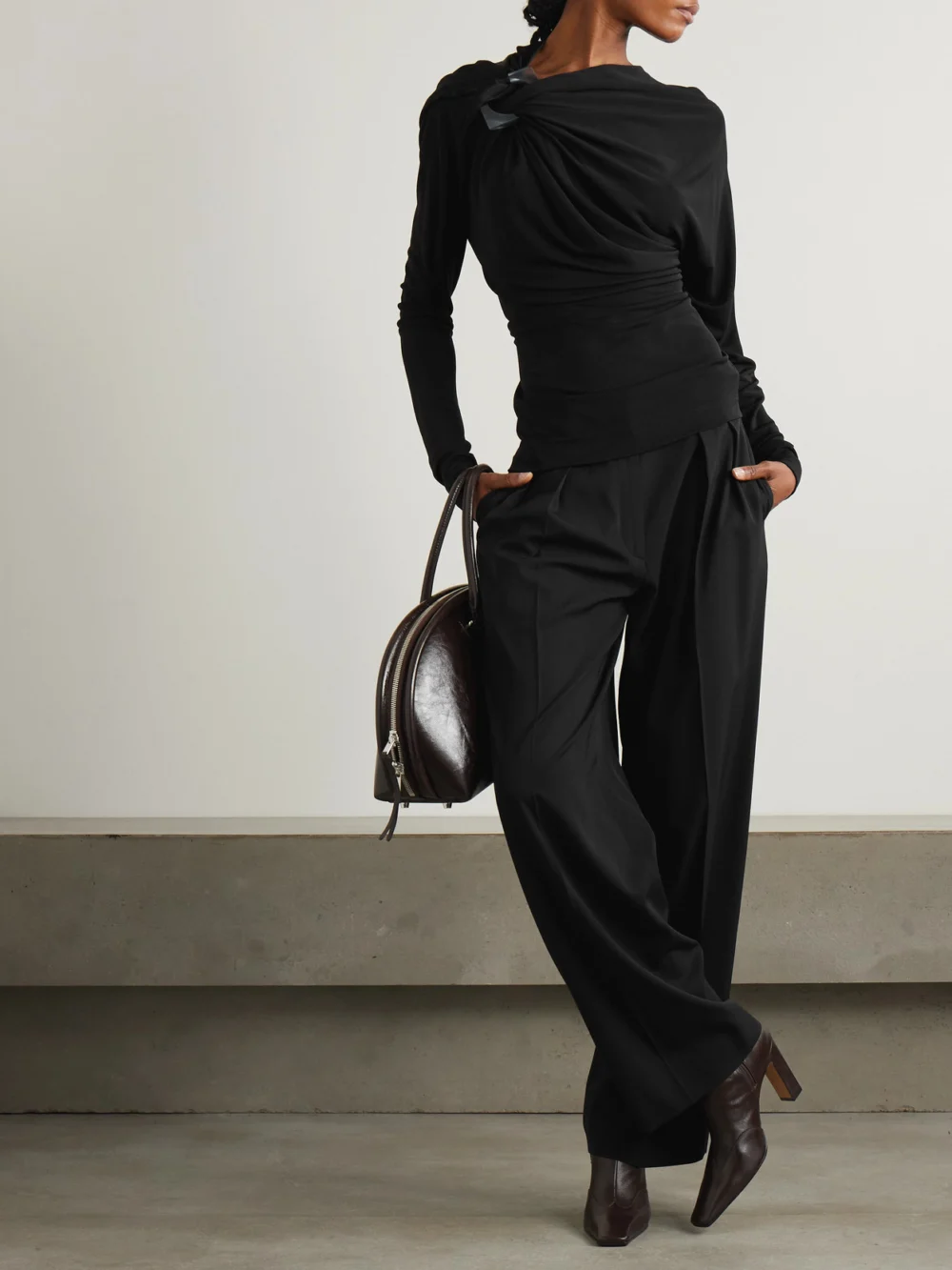 Victoria Beckham Asymmetric Embellished Draped Jersey Top, worn by a model