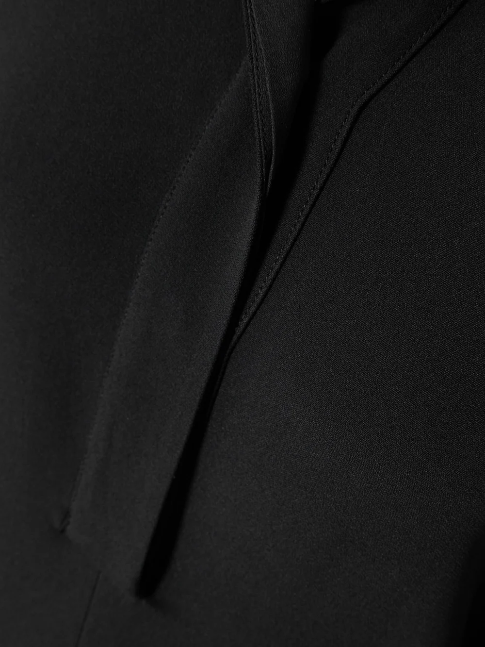 Close-up detail of the Victoria Beckham Asymmetric Gathered Crepe Shirt Dress