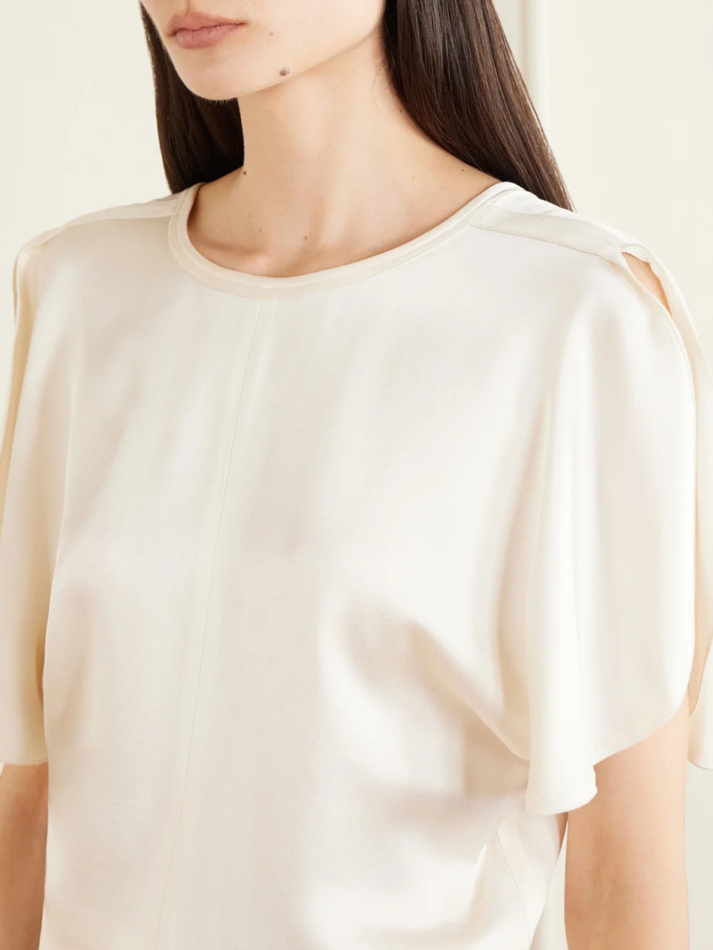 Close-up detail of the Victoria Beckham Bela Draped Satin Blouse