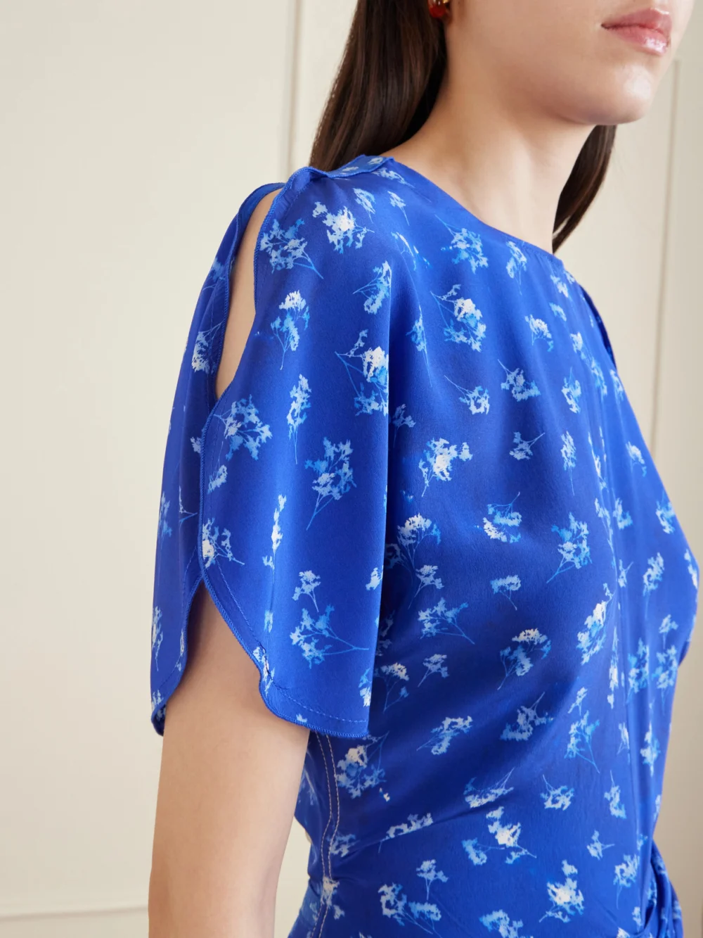Close-up detail of the Victoria Beckham Bela Floral-print Silk-chiffon Midi Dress