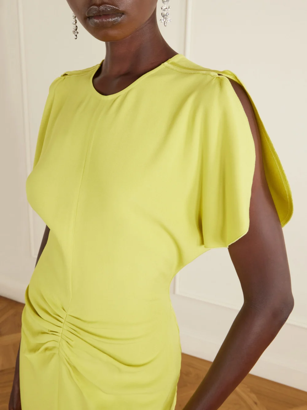Close-up detail of the Victoria Beckham Bela Gathered Satin Midi Dress