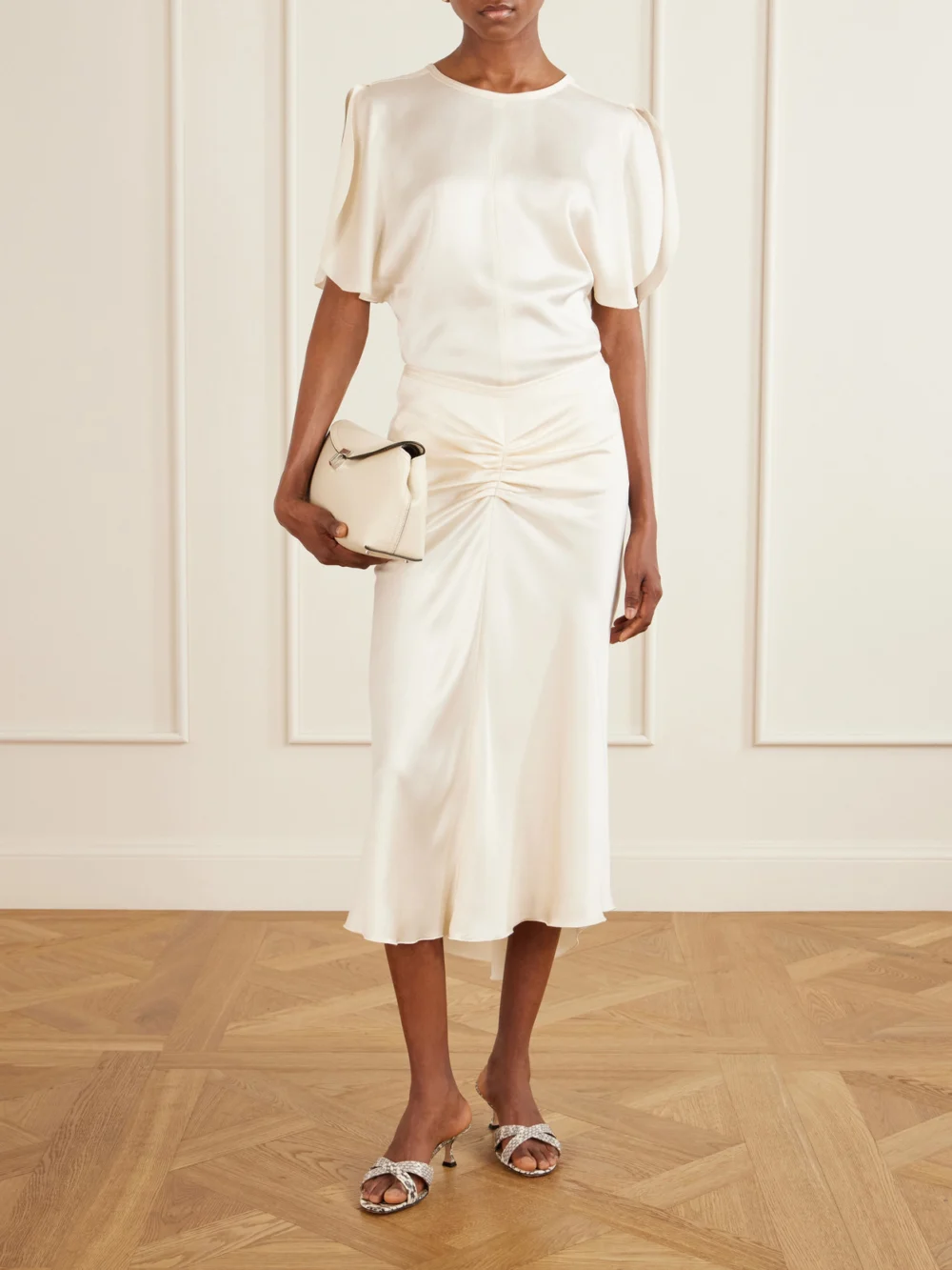 Victoria Beckham Bela Ruched Satin Midi Skirt, worn by a model