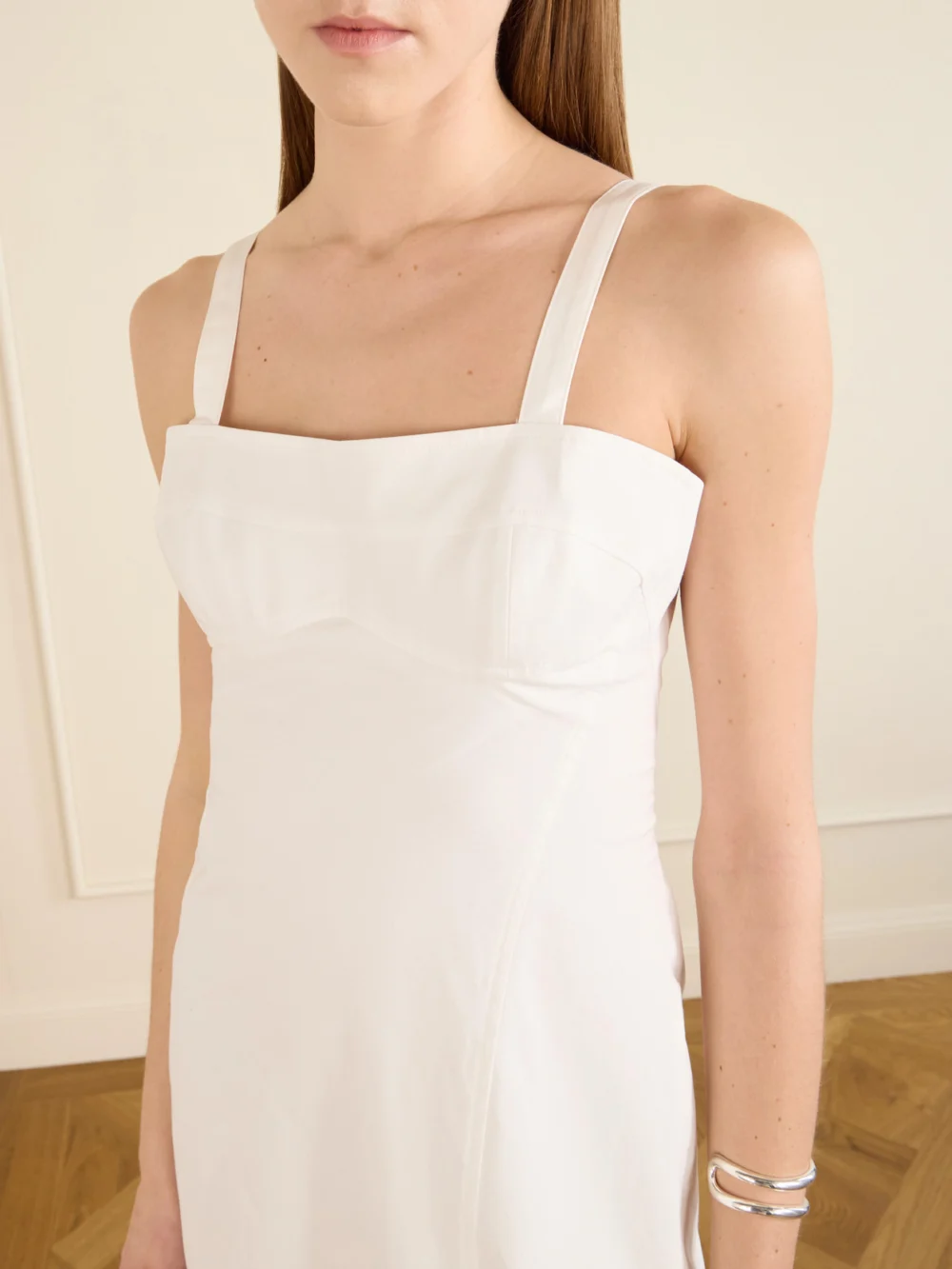 Close-up detail of the Victoria Beckham Cami Paneled Organic Cotton-blend Midi Dress