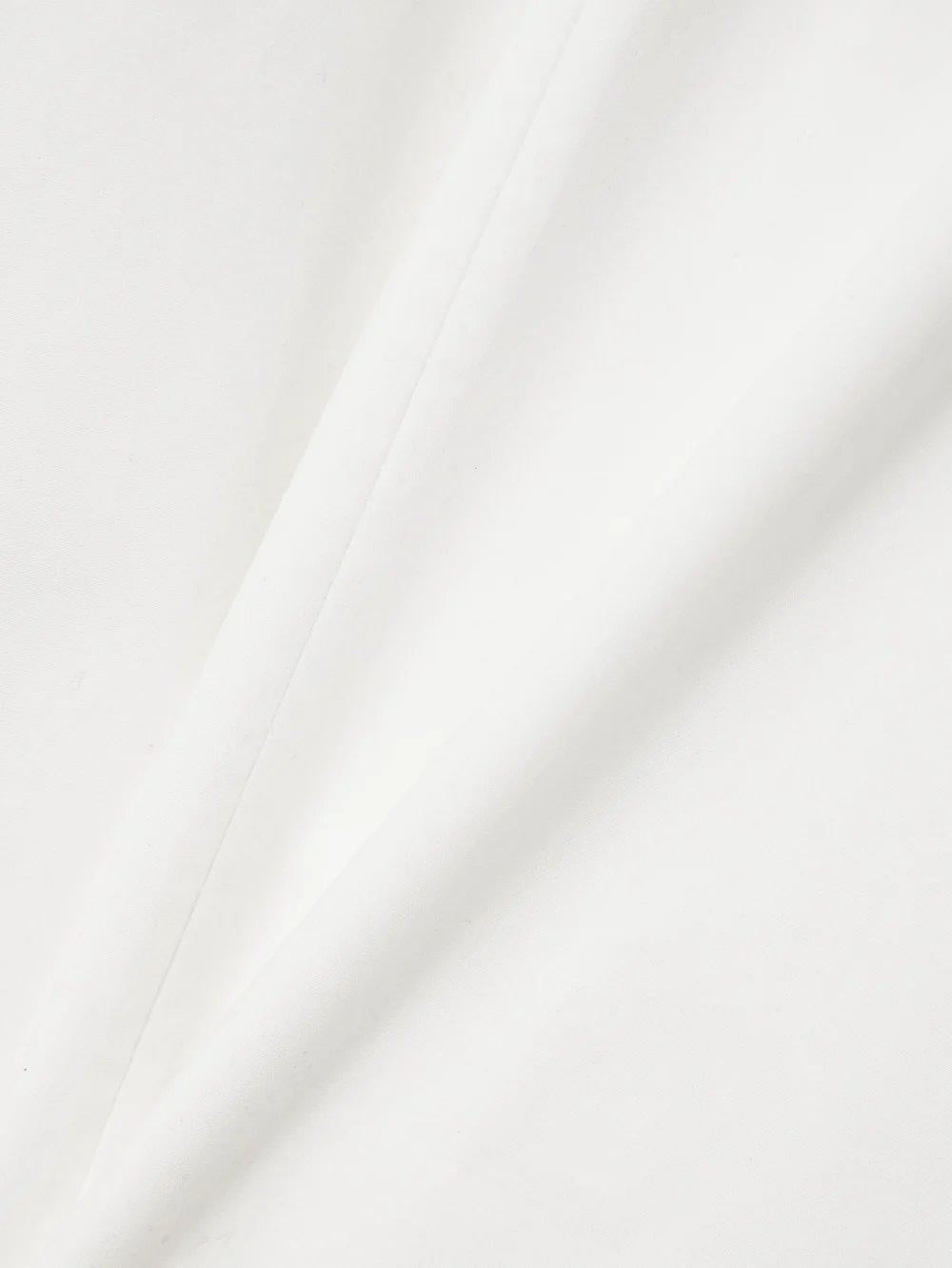 Close-up detail of the Victoria Beckham Cami Paneled Organic Cotton-blend Poplin Maxi Dress