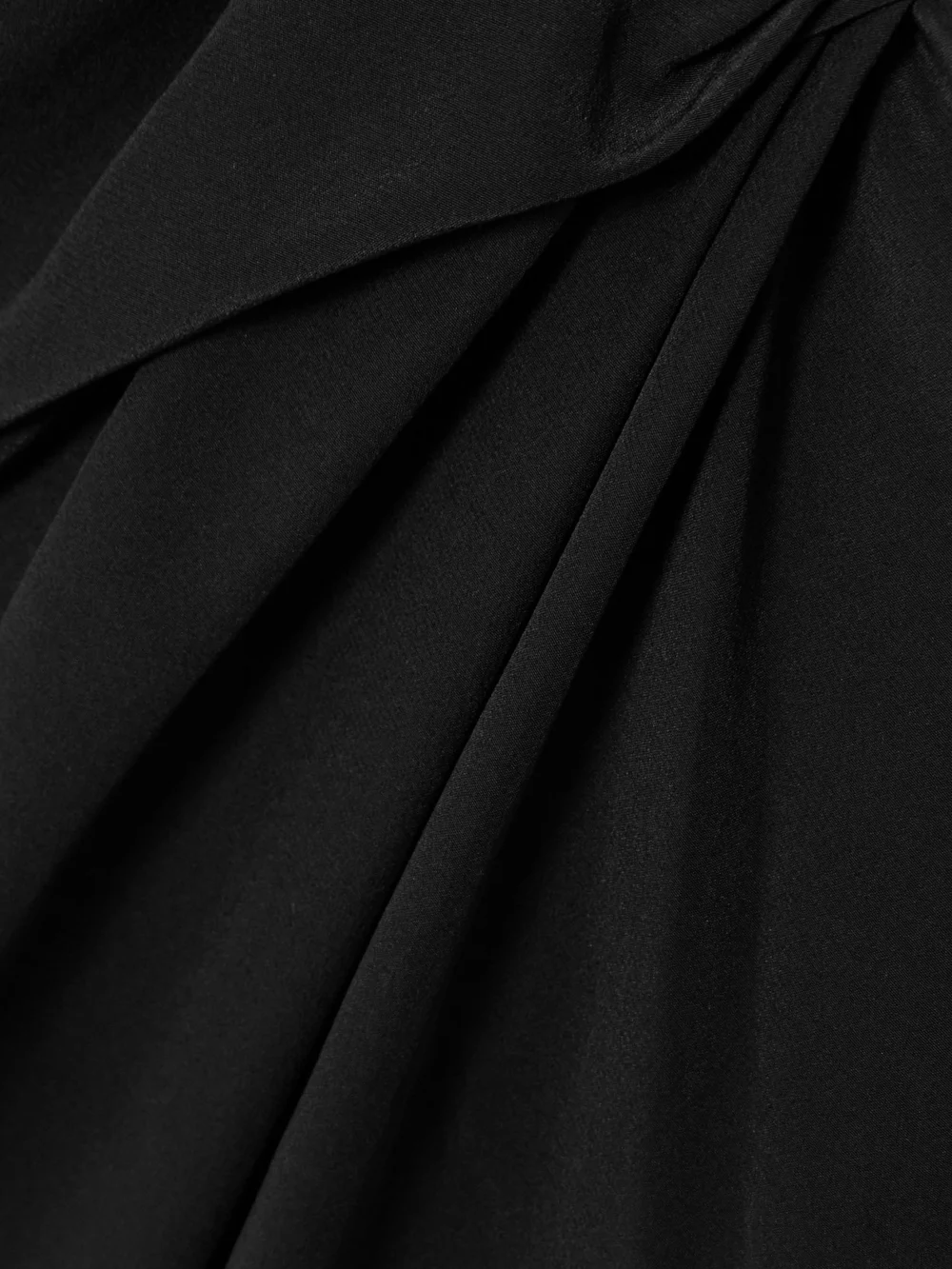 Close-up detail of the Victoria Beckham Chain-embellished Draped Silk Midi Dress