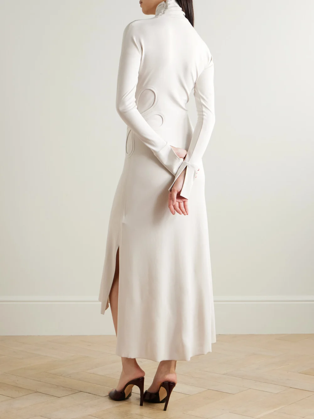 Back view of the Victoria Beckham Cutout Asymmetric Stretch-jersey Turtleneck Midi Dress
