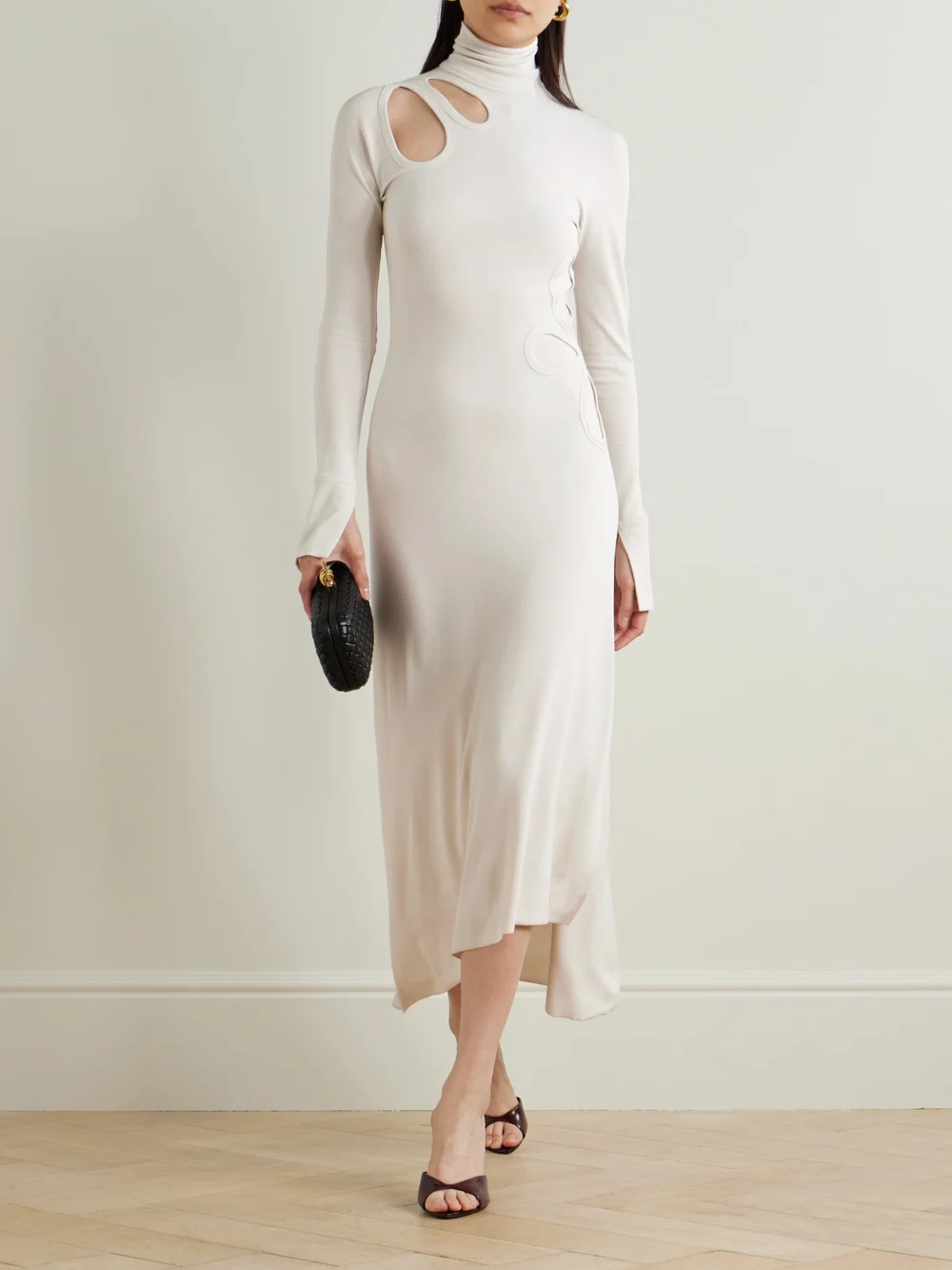 Victoria Beckham Cutout Asymmetric Stretch-jersey Turtleneck Midi Dress, worn by a model
