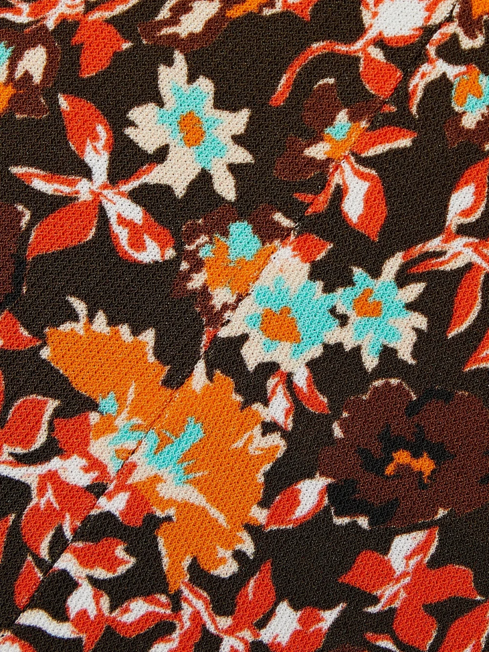 Close-up detail of the Victoria Beckham Cutout Floral-print Jersey Top