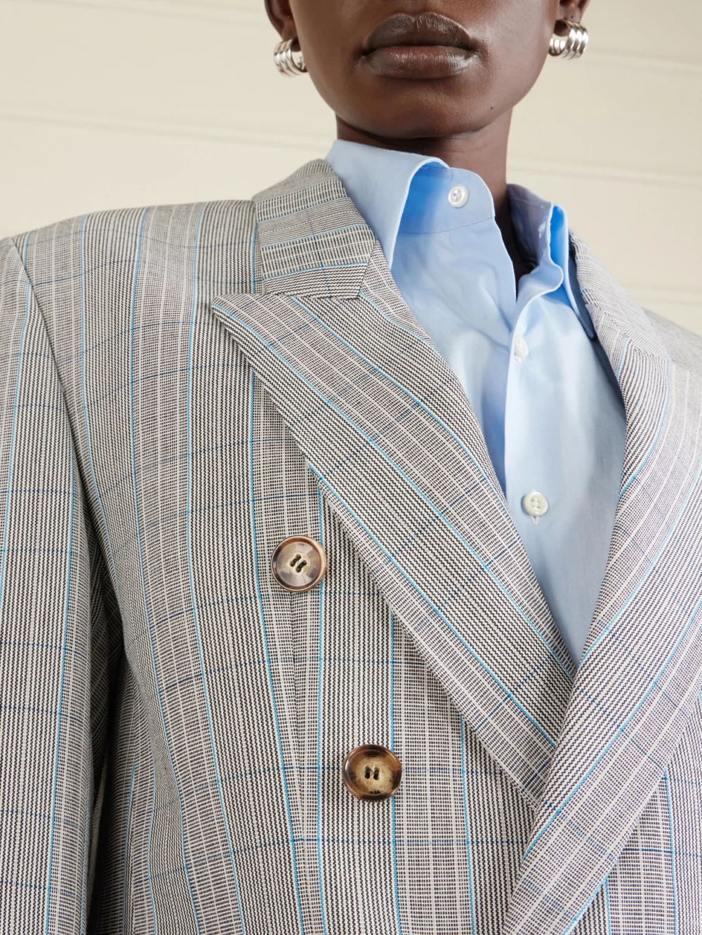 Close-up detail of the Victoria Beckham Double-breasted Checked Wool Blazer