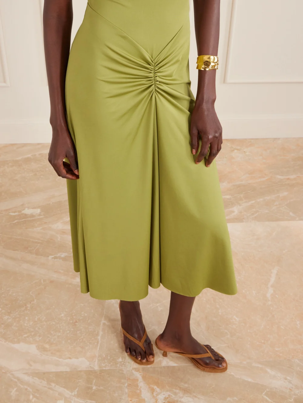 Close-up detail of the Victoria Beckham Gathered Satin-jersey Midi Dress