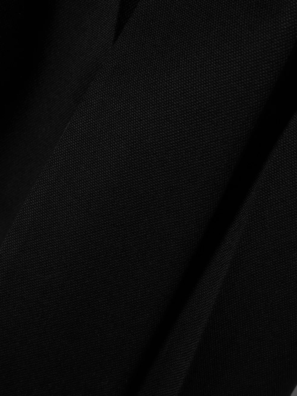 Close-up detail of the Victoria Beckham Gigi Satin-trimmed Crepe Straight-leg Pants